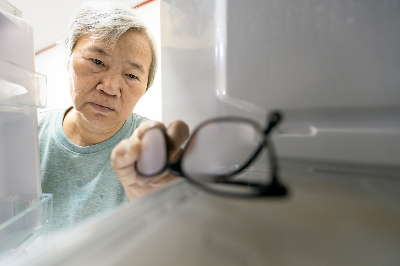 Alzheimer's patient keeping the reading glasses in refrigerator.